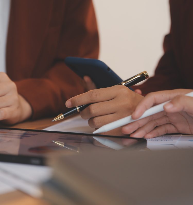 Business people are analyzing and planning business strategies.