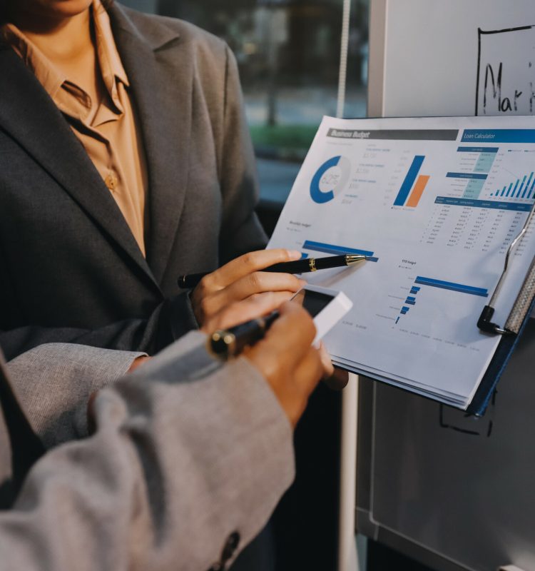 Business people are analyzing and planning business strategies.